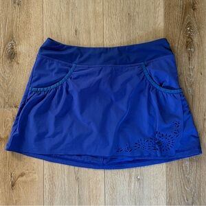 ATHLETA Blue Laser‑Cut Skort with Pockets – Size Small